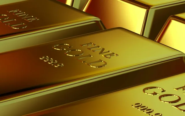 Stacked fine gold bars illustrating gold as a store of value during inflation.