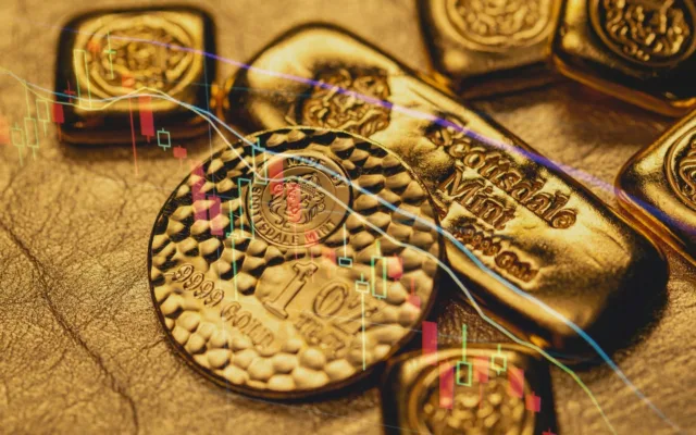 Gold bullion coin and bars with a declining candlestick chart illustrating the 2026 gold price outlook.